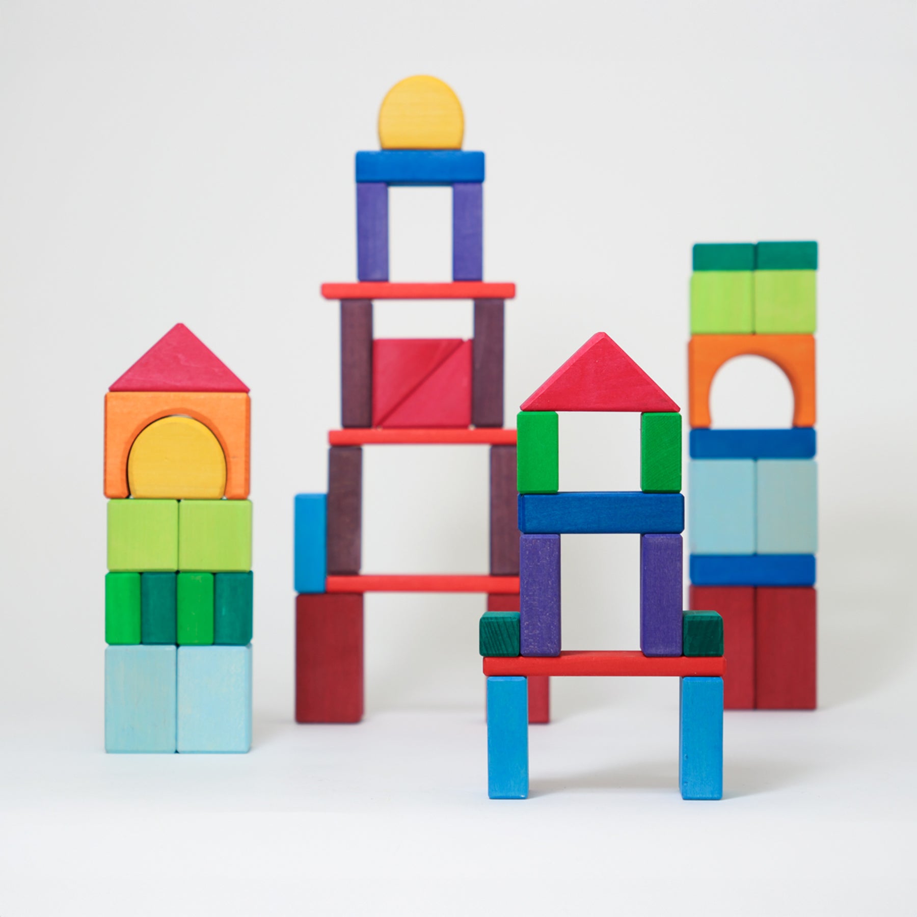 Set 60 cuburi geometrice din lemn colorate, 60 Colored Geo-Blocks – Grimms